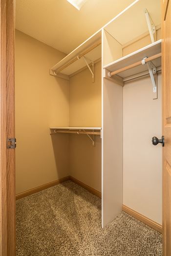 Large closet with lots of storage space and shelving at Grand Legacy Aparmtnets